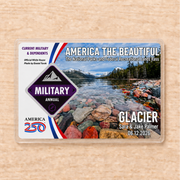 National Parks pass with scenic design on a wooden surface